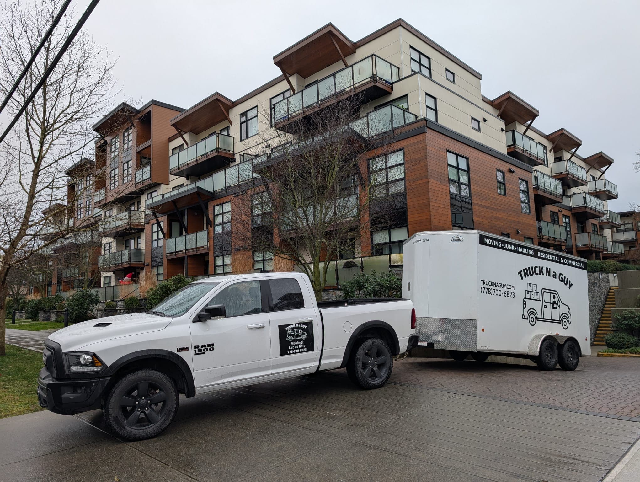 Truck and trailer at apartment building
